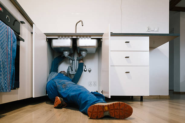 Professional Emergency Plumber technician working in Acushnet, MA
